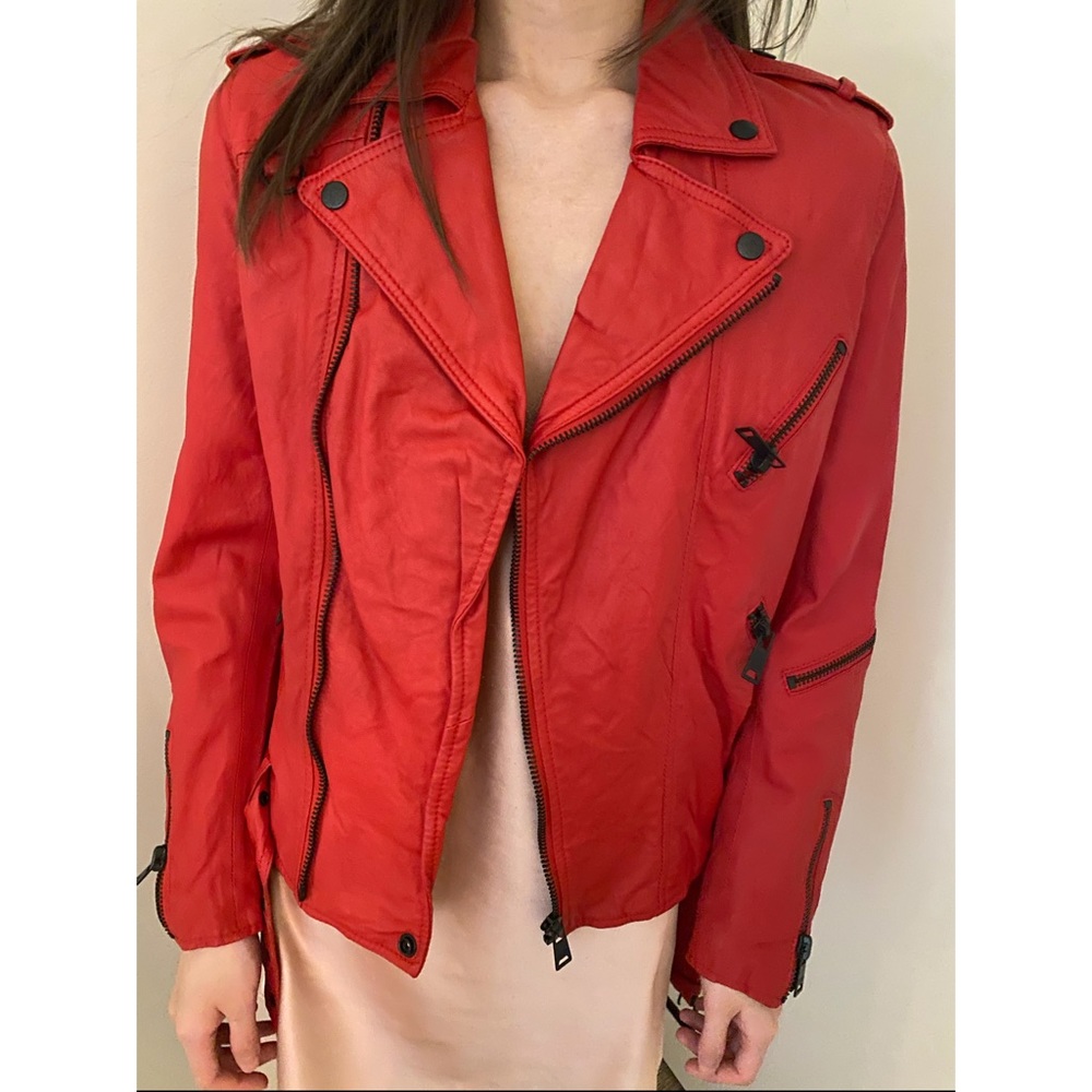Blue heroes red leather jacket